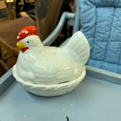 Sale Photo Thumbnail #40: Vintage ceramic hen-on-nest covered dish featuring painted red and yellow details on the head, with minor paint wear on the comb.