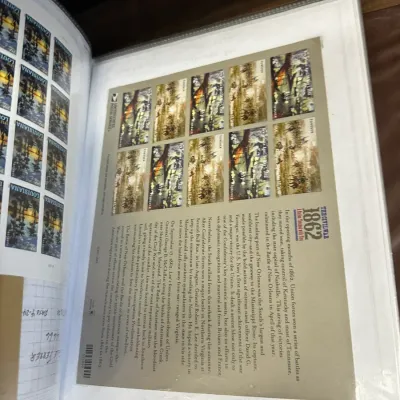 Sale Photo Thumbnail #103: Stamp collection binder featuring USPS Civil War 1862 commemorative souvenir sheets housed in plastic sleeves.