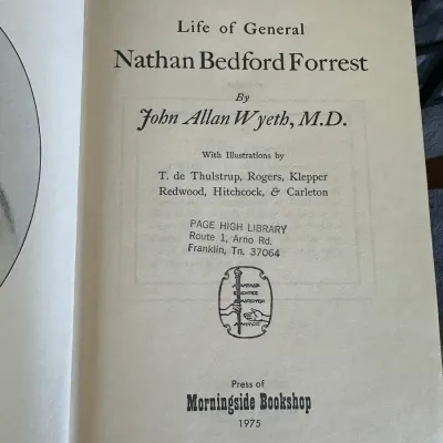Sale Photo Thumbnail #418: Title page of 'Life of General Nathan Bedford Forrest' by John Allan Wyeth, M.D., published by Morningside Bookshop in 1975. The volume features a library stamp from Page High Library on the inner page.