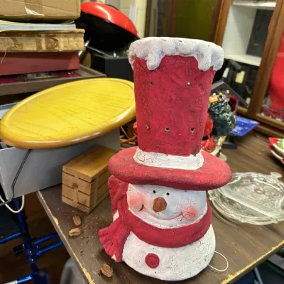 Sale Photo Thumbnail #317: Hand-painted folk art snowman luminary with a tall red hat, scarf, and distressed crackle finish.