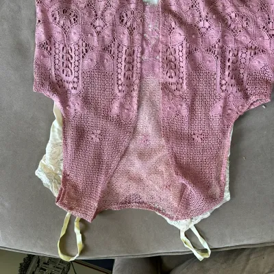 Sale Photo Thumbnail #623: Vintage mauve open-front lace bolero vest draped over a cream lace camisole.