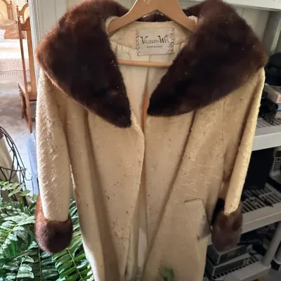 Sale Photo Thumbnail #657: Vintage cream-colored wool coat with dark brown fur collar and cuffs, featuring a Vaughan-Weil Birmingham store label.