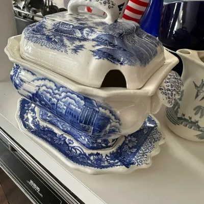 Sale Photo Thumbnail #702: Vintage blue and white transferware soup tureen with lid and matching underplate, featuring a scenic landscape design.