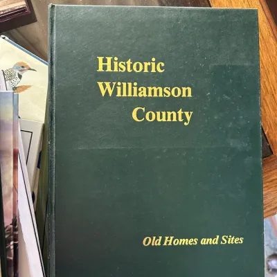 Sale Photo Thumbnail #446: Hardcover copy of "Historic Williamson County: Old Homes and Sites" in a dark green cloth binding with gold lettering.