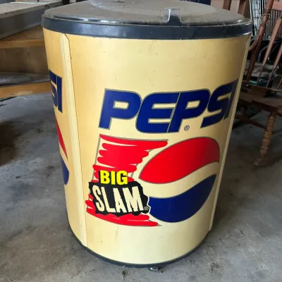 Sale Photo Thumbnail #732: Vintage 1990s Pepsi Big Slam barrel-style promotional party cooler on wheels, showing light wear and yellowing on the body.