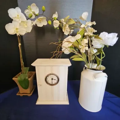 White Distressed Wood Eddie Bauer Cabinet Clock With Storage, Two Faux Flowers In Vases