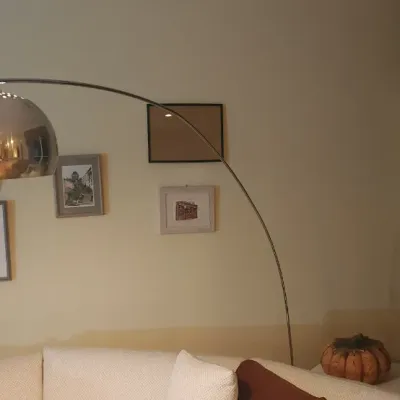 Sale Photo Thumbnail #38: Mid-century modern chrome arc floor lamp with a perforated dome shade.
