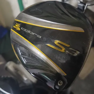 Sale Photo Thumbnail #346: Cobra S3 golf driver head in black, silver, and yellow colorway showing minor surface wear.
