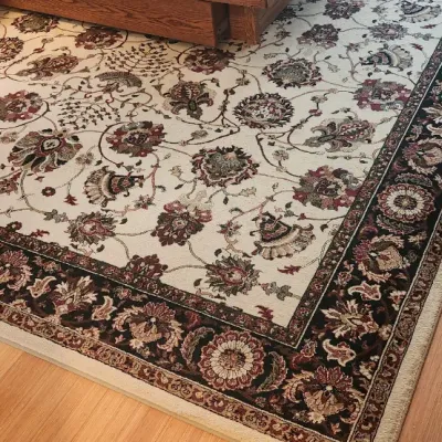 Sale Photo Thumbnail #90: Large traditional Persian-style area rug featuring an ivory field with floral motifs and a dark ornate border.