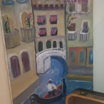 Sale Photo Thumbnail #198: Unframed oil painting on canvas depicting a Venetian canal with a gondolier, buildings, and a bridge.