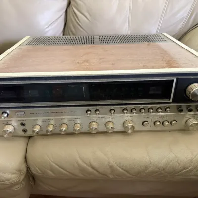 Sale Photo Thumbnail #37: Vintage Sansui QRX-7001 4-channel quadraphonic receiver featuring silver-tone knobs and faceplate with a wood cabinet.