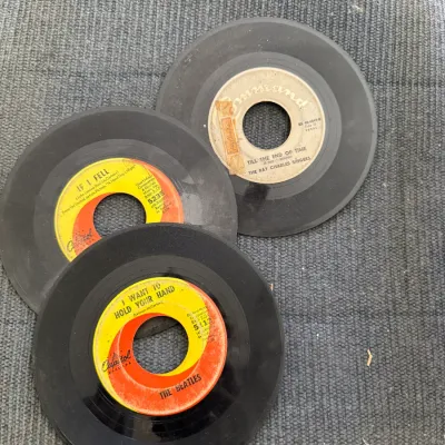 Sale Photo Thumbnail #54: Trio of vintage 45 RPM vinyl records, including two Beatles singles on the Capitol label and a Ray Charles Singers single on Command.