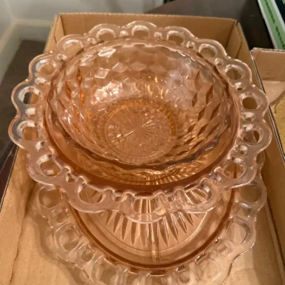 Sale Photo Thumbnail #25: Vintage pink depression glass bowls featuring openwork lace-edge rims and geometric quilted pattern details.