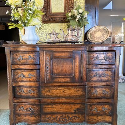 Sale Photo Thumbnail #21: Antique French Provincial wooden buffet, also called a Commode. The chest is made of solid wood and  in excellent condition. Has a center cabinets, six side drawers and two larger bottom drawers. Need to provide own transportation. 
