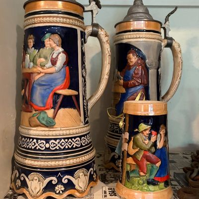 Sale Photo Thumbnail #12: Vintage German lidded beer steins circa 1950s