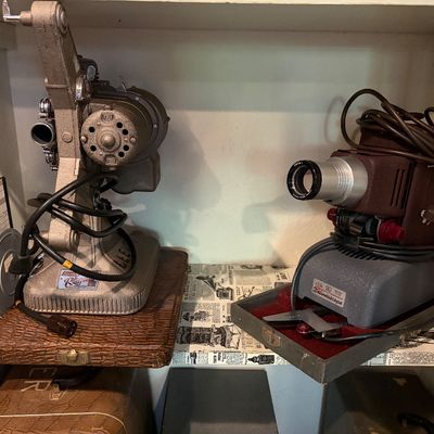 Sale Photo Thumbnail #17: Vintage movie projector with reels and slide projector