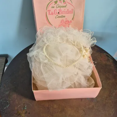 Sale Photo Thumbnail #69: Vintage mid-century bridal veil with beaded headpiece in its original pink T. & G. Bridal Creation box.