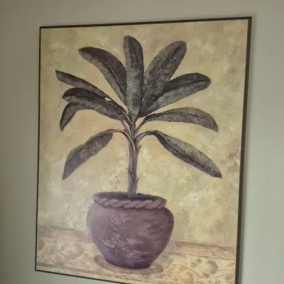 Sale Photo Thumbnail #64: Framed still life artwork depicting a potted tropical plant on a textured neutral background.