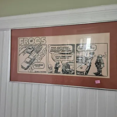 Sale Photo Thumbnail #58: Framed 1984 'Frogs' comic strip by Mike Hoffen in a silver metal frame with dark matting.