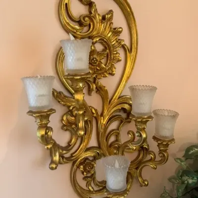 Vintage Syroco-style gilt scrollwork wall sconce featuring five arms with textured frosted glass candle votives.