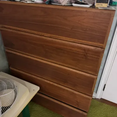 Sale Photo Thumbnail #41: Mid-century modern style wooden tallboy dresser with five drawers.