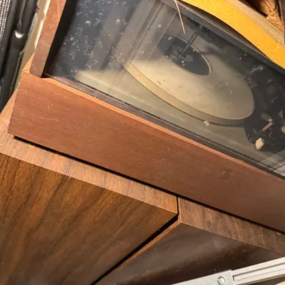 Sale Photo Thumbnail #12: Vintage stereo console component with record player, housed in a walnut wood cabinet.