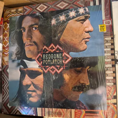 Sale Photo Thumbnail #158: Vintage vinyl LP copy of Redbone's album "Potlatch", released in 1970 on Epic Records, in original shrink wrap.