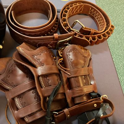 Sale Photo Thumbnail #120: Leather holsters and belts 