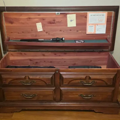 Vintage Lane cedar chest with decorative faux-drawer front panels, brass bail handles, and original interior paper documentation.