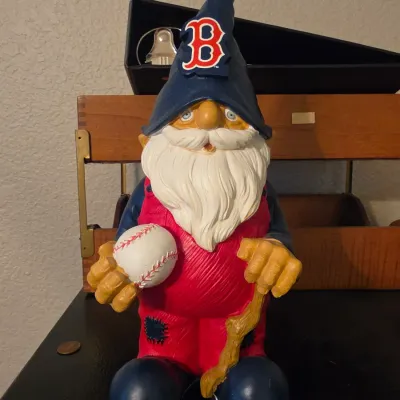 Boston Red Sox lawn gnome figure, holding a baseball and wooden staff, featuring MLB team colors and logo.