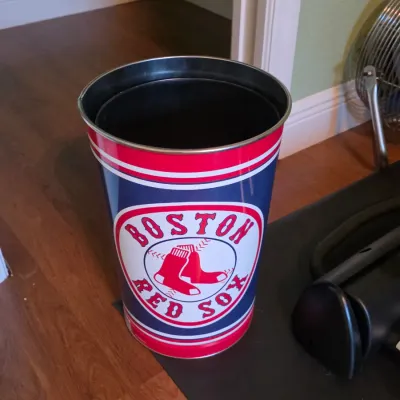Vintage Boston Red Sox metal trash can featuring team graphics in red, white, and blue.