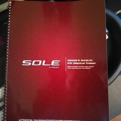 Spiral-bound Sole Fitness owner's manual for an E55 Elliptical Trainer.