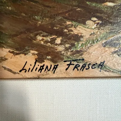 Sale Photo Thumbnail #71: Close-up detail of an artist signature reading 'Liliana Frasca' on an oil painting with a textured canvas liner.