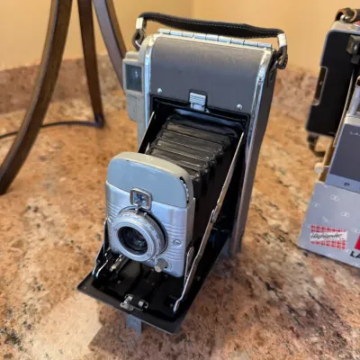 Sale Photo Thumbnail #191: Vintage Polaroid Highlander Model 80 folding land camera, circa 1950s.