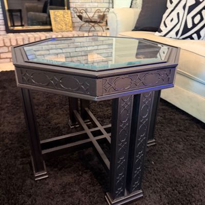 Sale Photo Thumbnail #37: Black painted hexagonal end table featuring a glass insert top and carved geometric lattice details.