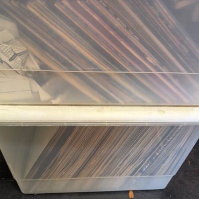 Sale Photo Thumbnail #111: Two clear plastic storage bins filled with vintage vinyl LP records.