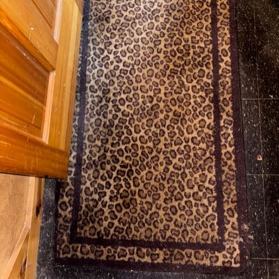 Sale Photo Thumbnail #83: Rectangular leopard print accent rug featuring a dark brown border design.