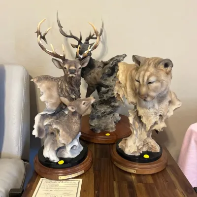 Sale Photo Thumbnail #21: Collection of three Mill Creek Studios wildlife sculptures on wood bases, including deer and a cougar, accompanied by a Certificate of Authenticity.