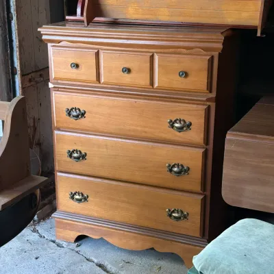 Sale Photo Thumbnail #292: Traditional wooden tallboy dresser with brass hardware and a matching wooden storage box sitting on top.