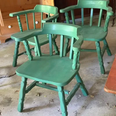 Sale Photo Thumbnail #286: Set of three vintage wooden captain's chairs painted in a matte green finish.