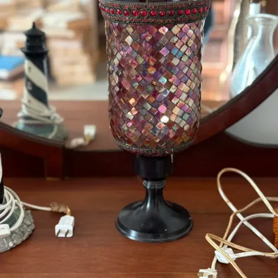 Sale Photo Thumbnail #13: Iridescent mosaic glass storm shade or hurricane lamp insert on a black metal pedastal base, featuring red jewel accents around the rim.