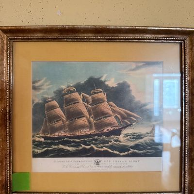Sale Photo Thumbnail #74: Framed maritime art print depicting the clipper ship Dreadnought off Tuskar Light, presented in a matted gold-finished beaded frame.