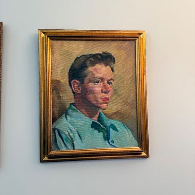 Sale Photo Thumbnail #42: Mid-century oil painting on canvas depicting a portrait of a young man in a teal shirt, framed in a gilt wooden frame.