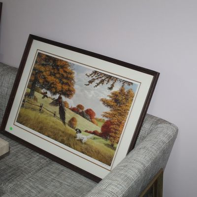 Sale Photo Thumbnail #15: Large framed hunting print depicting a spaniel and pheasants in an autumn landscape, displayed alongside additional framed artwork.