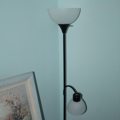Sale Photo Thumbnail #85: Modern black metal torchiere floor lamp with an adjustable reading light and frosted white glass shades.