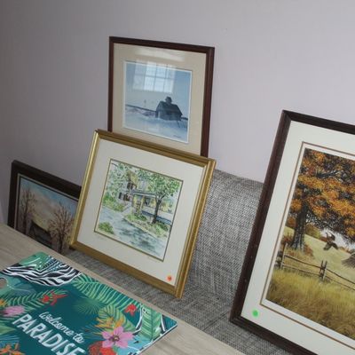 Sale Photo Thumbnail #16: Collection of framed art prints including landscape, house, and pheasant wildlife themes, displayed alongside a colorful tropical serving tray.