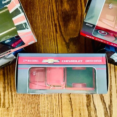 Sale Photo Thumbnail #82: Collection of die-cast metal pickup trucks in original retail boxes, including a 1958 Chevy Apache Fleetside and Ford replicas.
