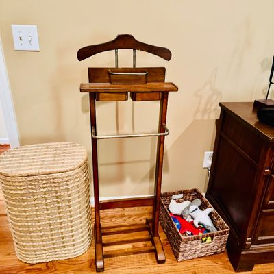 Sale Photo Thumbnail #51: Vintage dark wood valet stand with small drawers, jacket hanger, metal trouser bar, and shoe rack base.