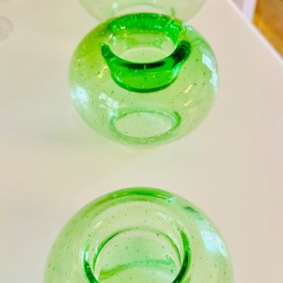 Sale Photo Thumbnail #34: Trio of mid-century green controlled bubble glass candle holders or small vases featuring a rounded form.