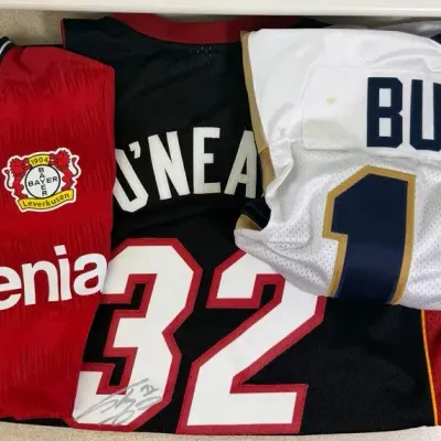 Signed Shaquille O’Neal Miami Heat & Mark Bulger Rams Jerseys